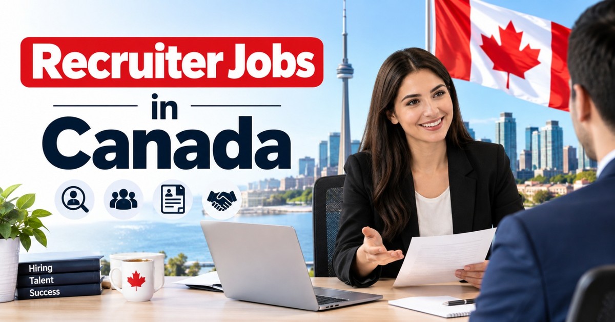 A recruiter smiling and gesturing while talking with a candidate across a desk, with the Toronto waterfront, the CN Tower and a Canadian flag behind her